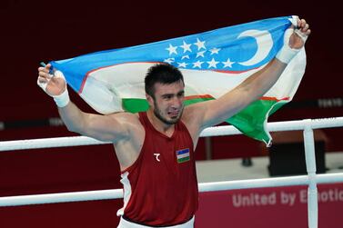 Bakhodir Jalolov of Uzbekistan celebrates following the Men's Super Heavy (+91kg) Final Bout against Richard Torrez Jr (left) at the Kokugikan Arena on the sixteenth day of the Tokyo 2020 Olympic Games in Japan. Picture date: Sunday August 8, 2021. (Photo by Adam Davy / PA Images via Getty Images)