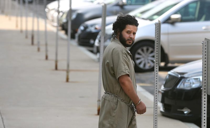 Mufid Elfgeeh, who was accused of providing material support to ISIL, is taken from his arraignment in Rochester, New York, in June. Thousands of foreigners are believed to be supporting or fighting for the militant group. Shawn Dowd / AP Photo / Democrat & Chronicle