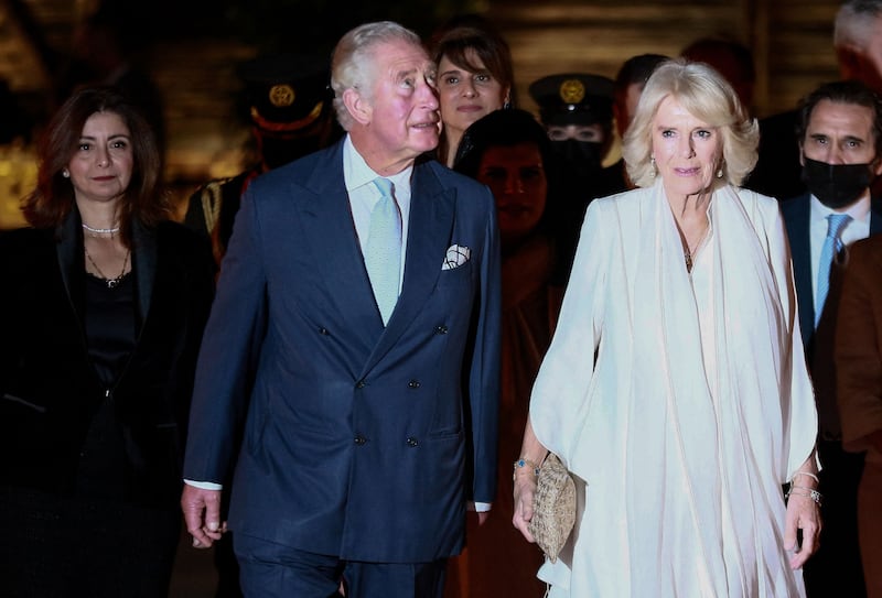 The royal couple arrive at the celebration. AFP