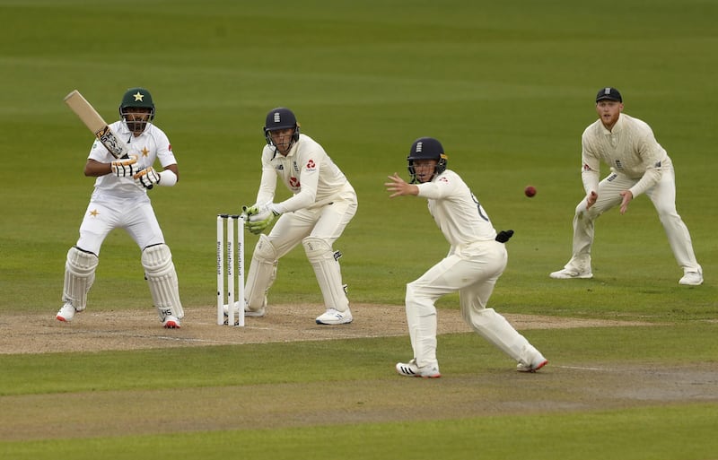 Pakistan batsman Babar Azam's shot evades England's close fielders. AP