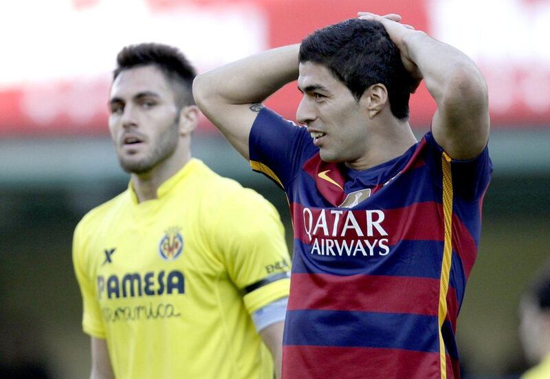 Barcelona's Luis Suarez reacts during his team's 2-2 draw against Villarreal in La Liga on Sunday. Alberto Saiz / AP / March 20, 2016 