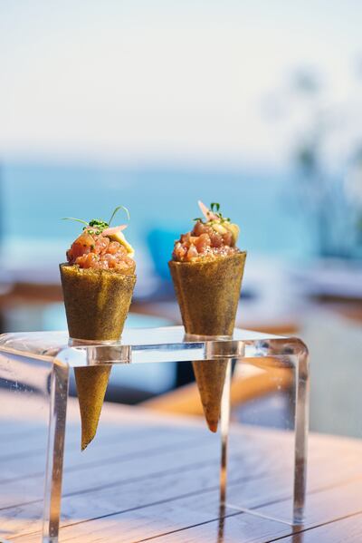 Tasca serves tuna and Wagyu tartare in crunchy cones made from brick pastry leaves. Photo: Tasca