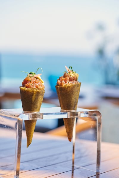 Tasca serves tuna and Wagyu, pictured, tartare in crunchy cones made from brick pastry leaves. Photo: Tasca