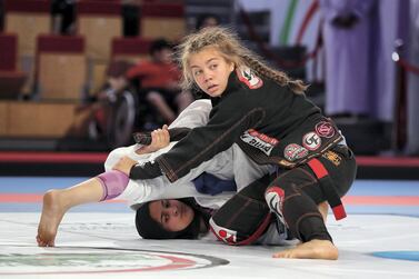 Aylla Silva in action against Asma Hasan Ali Hasan Al Hosani during the 57kg final at the Abu Dhabi World Pro on Sunday. Pawan Singh / The National