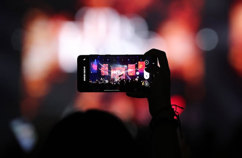 The Rose, a South Korean pop rock band, sang hits such as 'Sorry' during the concert. Pawan Singh / The National 