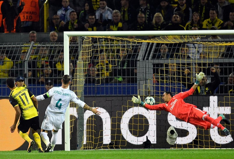 Pierre-Emerick Aubameyang, left, scores Borussia Dortmund's goal. Martin Meissner / AP Photo