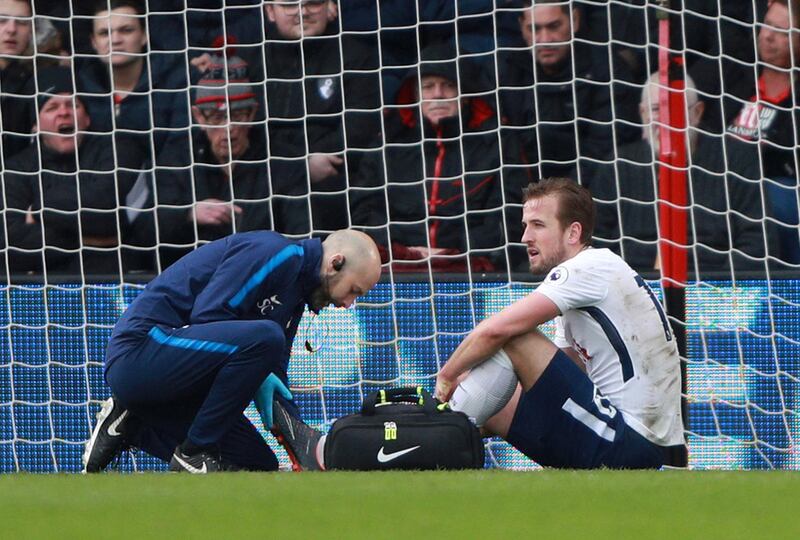 Soccer Football - Premier League - AFC Bournemouth vs Tottenham Hotspur - Vitality Stadium, Bournemouth, Britain - March 11, 2018   Tottenham's Harry Kane receives medical attention after sustaining an injury    REUTERS/Ian Walton    EDITORIAL USE ONLY. No use with unauthorized audio, video, data, fixture lists, club/league logos or "live" services. Online in-match use limited to 75 images, no video emulation. No use in betting, games or single club/league/player publications.  Please contact your account representative for further details.