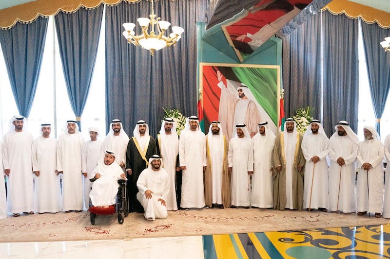 ABU DHABI, UNITED ARAB EMIRATES - June 08, 2019: HH Sheikh Mohamed bin Zayed Al Nahyan, Crown Prince of Abu Dhabi and Deputy Supreme Commander of the UAE Armed Forces (8th R), stand for a photograph during a wedding reception held for Hamad bin Kardous Al Ameri (9th R) and Mansour bin Kardous Al Ameri (10th R), at the Armed Forces Officers Club. Seen with HE Hamad Bin Kardous Al Ameri, General Manager of Zayed Bin Sultan Al Nahyan Foundation for Charitable and Humanitarian Affairs (4th R), HH Sheikh Mohamed bin Butti Al Hamed (5th R), HH Sheikh Suroor bin Mohamed Al Nahyan (6th R), Mohamed Bin Kardous Al Ameri (7th R), HH Major General Pilot Sheikh Ahmed bin Tahnoon bin Mohamed Al Nahyan, Chairman of the National and Reserve Service Authority (13th R) and HH Sheikh Saif bin Mohamed bin Butti Al Hamed (14th R).

( Hamad Al Kaabi / Ministry of Presidential Affairs )​
---