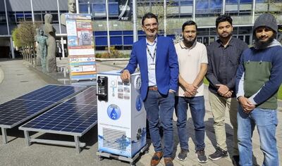 Dr Muhammad Wakil Shahzad, from the University of Northumbria in the UK, with other researchers and the solar-powered Air2Water device. Photo: Dr Muhammad Wakil Shahzad