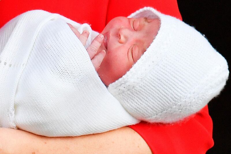 Britain's Catherine, Duchess of Cambridge holds her newly-born son outside the Lindo Wing at St Mary's Hospital, London, on April 23, 2018.  (AFP / John Stillwell)