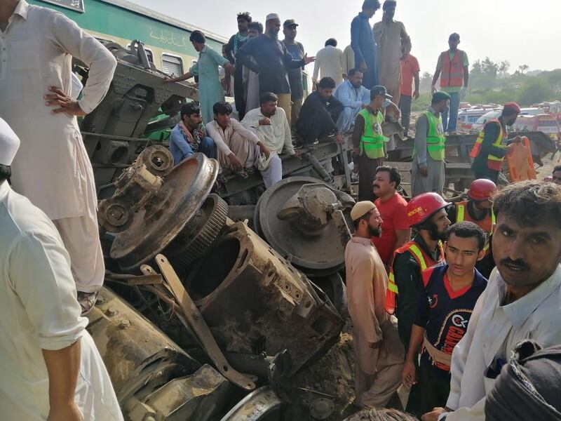 At least 11 people died and more than 60 were injured when a passenger train rammed into a stationary freight train at Walhar Railway Station in Rahim Yar Khan district of Punjab province.  EPA
