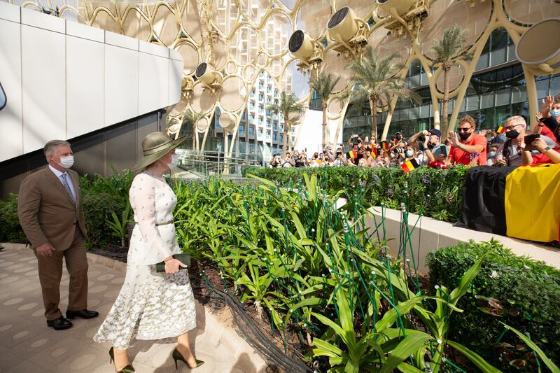 She accessorised her dress with a matching clutch and pumps by Maison Natan and an olive green hat by Maison Fabienne Delvigne. Photo: Expo 2020 Dubai