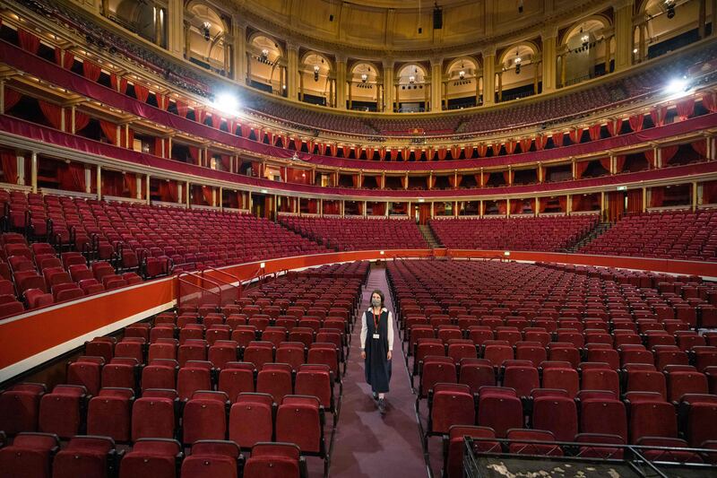 A member of staff poses inside the Royal Albert Hall in London on July 15, 2021