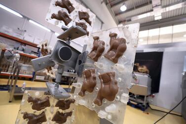 A herd of miniature chocolate camels on the production line at Al Nassma. Chris Whiteoak / The National