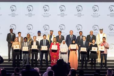 ABU DHABI, UNITED ARAB EMIRATES. 13 JANUARY 2020. The Zayed Sustainability Awards held at ADNEC as part of Abu Dhabi Sustainability Week. The winners from Top row center is H.E. Sheikh Mohammed bin Zayed Al Nahyan, Crown Prince of Abu Dhabi and Deputy Supreme Commander of the United Arab Emirates Armed Forces. LtoR in the bottom row: Health Winner: Globhe, Sweden. Food Winner: Okuafu Foundation, Ghana. Energy Winner: Electricians Without Borders, France. Water Winner: Ceres Imaging, USA. Global High Schools Winner: The Americas, Air Batalla, Columbia. Global High Schools Winner: Sub Sahara Africa, HakimiAliyu Day Secondary School, Nigeria. Global High Schools Winner: Middle East and North Africa, Al Amal Junior High School, Morocco. Global High Schools Winner: Europe and Central Asia, United World College Mostar, Bosnia and Herzegovina. Global High Schools Winner: South Asia, Bloom Nepal School, Nepal. Global High Schools Winner: East Asia and Pacific, Eutan Tarawa IETA Junior Secondary School, Kiribati. (Photo: Antonie Robertson/The National) Journalist: Kelly Clarker. Section: National.