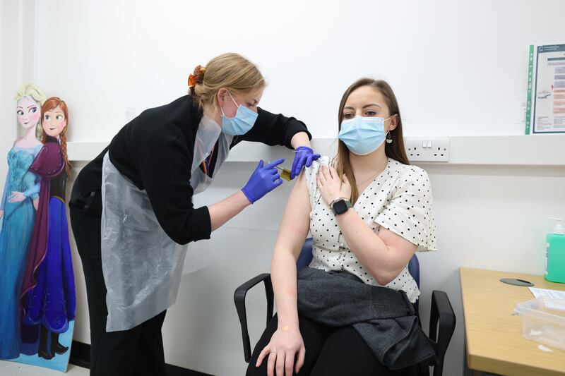 Holly Fox receives a Moderna Omicron Covid-19 booster vaccine in a clinical study at St George's University in Tooting, south-west London, on February 17. PA