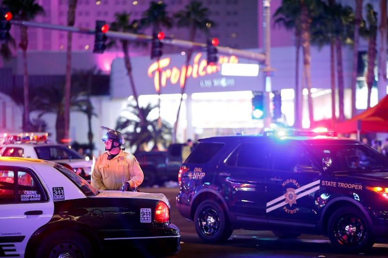 Las Vegas Metro Police officer stands by at a staging area in the junction of Tropicana Avenue and Las Vegas Boulevard South. Steve Marcus / Las Vegas Sun / Reuters