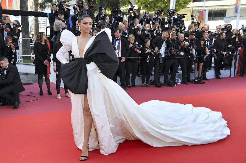Danish-born Indian actress Deepika Padukone poses as she arrives for the screening of the film "Rocketman" at the 72nd edition of the Cannes Film Festival in Cannes, southern France, on May 16, 2019. (Photo by Alberto PIZZOLI / AFP)