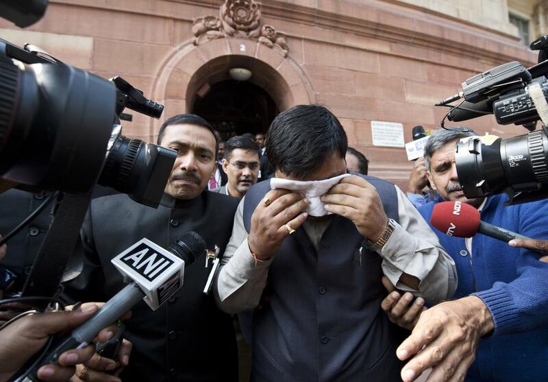 A reader says activities of some of the MPs in Indian parliament have brought shame to the country. Prakash Singh / AFP

