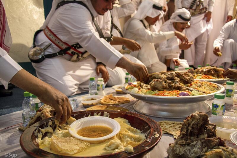 Mansour Al Shahri, from Saudi Arabia, spotlights residents of the Southern region of Saudi Arabia, in the city of Tanumah. The story highlights the mix of old and new through showing a traditional meal to which modern touches have been added such as an Al Marai drink. Courtesy National Geographic Abu Dhabi