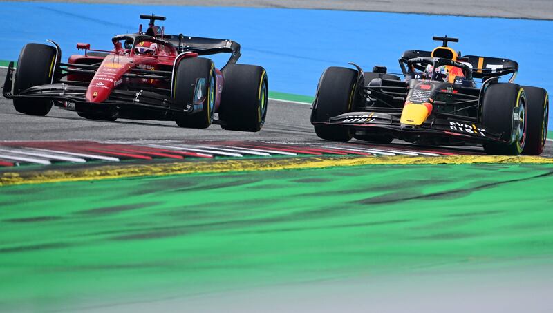 Ferrari's Charles Leclerc and Max Verstappen of Red Bull during the race. AFP
