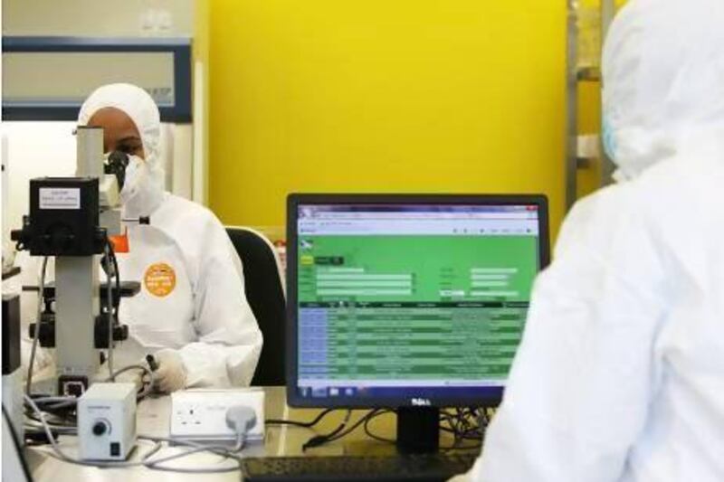A lab technician working in the new Central Veterinary Research Laboratory in Dubai . Pawan Singh / The National