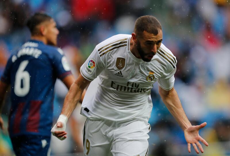 Real Madrid's Karim Benzema celebrates after scoring his side's first goal. AP Photo