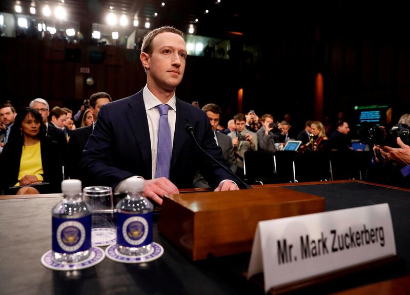FILE PHOTO: Facebook CEO Mark Zuckerberg arrives to testify before a Senate Judiciary and Commerce Committees joint hearing regarding the company’s use and protection of user data, on Capitol Hill in Washington, U.S., April 10, 2018. Picture taken April 10, 2018.  REUTERS/Aaron P. Bernstein/File Photo