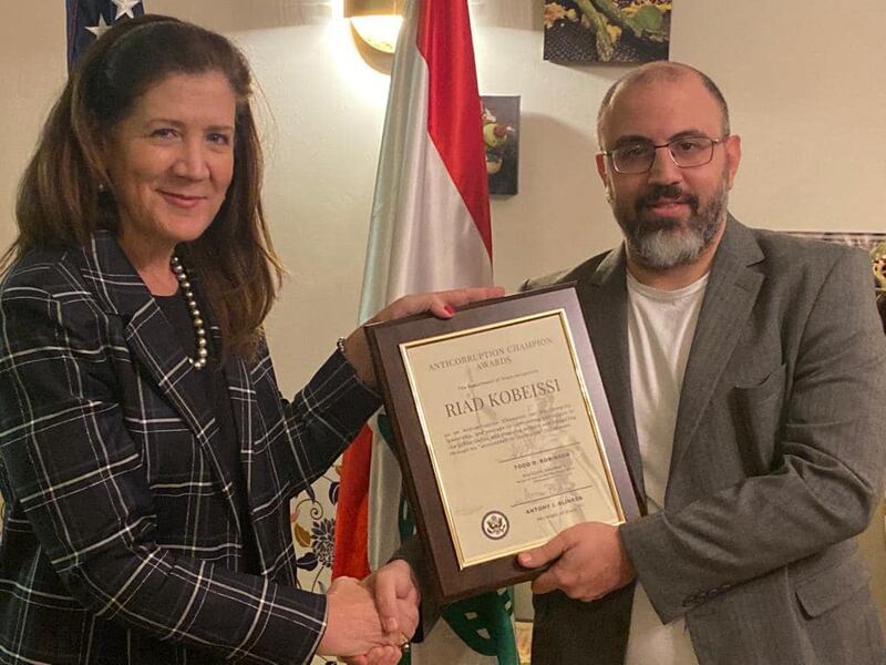 Riad Kobaissi receives his anti-corruption award from US ambassador Dorothy Shea. Courtesy: Riad Kobaissi / Facebook
