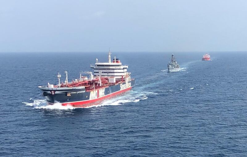 epa07740309 A handout picture provided by the British Ministry of Defence (MOD) shows (L-R) the Stena Important being accompanied by the British Navy frigate HMS Montrose and the Sea Ploeg vessel through the Strait of Hormuz between the Persian Gulf and the Gulf of Oman, 25 July 2019. The Royal Navy has started providing escort for British-flagged ships passing through the Strait of Hormuz  following Iran's seizure of British-flagged tanker Stena Impero.  EPA/MOD/BRITISH MINISTRY OF DEFENCE/HANDOUT MANDATORY CREDIT: MOD/CROWN COPYRIGHT HANDOUT EDITORIAL USE ONLY/NO SALES