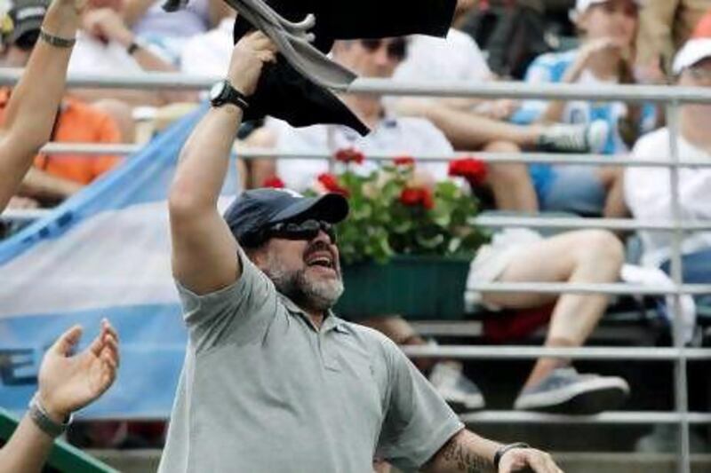 Diego Maradona, recently hired to be a cheerleader of sorts for sports in the UAE, was working up the crowd during Argentina's Davis Cup semi-final against the Czech Republic.