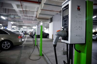 An electric car charging station in a parking lot in Shanghai. Reuters