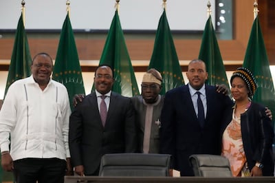 Officials at the talks, from left, Kenya's former president Uhuru Kenyatta, the lead negotiator for Ethiopia's government, Redwan Hussein, African Union envoy Olusegun Obasanjo, lead Tigray negotiator Getachew Reda, and former South Africa's vice president Phumzile Mlambo-Ngcuka. AP