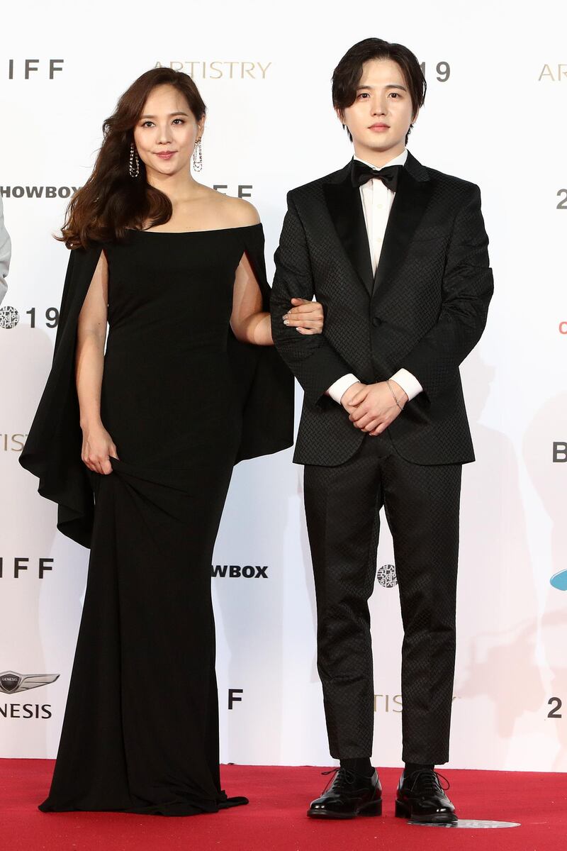 Actress Yoo Jin and actor Kim Ho-sung arrive for the Opening Ceremony of the 24th Busan International Film Festival. Getty Images