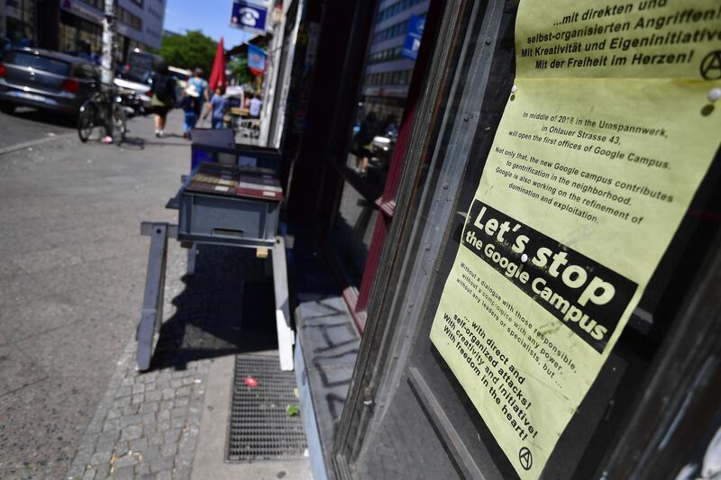 A sheet promoting an anti-Google action is pictured in Berlin's Kreuzberg district on May 22, 2018. Global cities from Seoul to Tel Aviv have welcomed Google with open arms, but in the bohemian Berlin district of Kreuzberg the Silicon Valley giant has found itself on the frontlines of gentrification trench warfare. Its new Berlin hub now in the making -- 3,000 square metres (32,000 square feet) hosting offices, a cafe and a coworking space in a once-derelict industrial building -- is set to be the latest outpost of California startup culture in Europe. But a campaign dubbed "Fuck Off Google" has begun organising monthly demonstrations at the site of the company's future "campus", set to open later this year.
 - TO GO WITH AFP STORY by BY DAPHNE ROUSSEAU
 / AFP / Tobias SCHWARZ / TO GO WITH AFP STORY by BY DAPHNE ROUSSEAU
