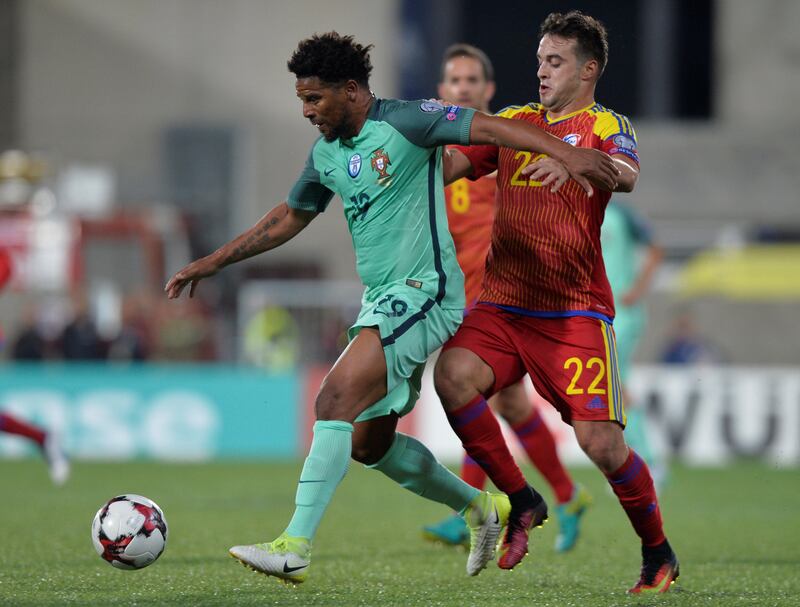 Portugal’s Eliseu in action with Andorra’s Victor Rodriguez. Vincent West / Reuters