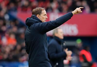 PSG coach Thomas Tuchel gives instructions during the French League One soccer match between Paris Saint-Germain and Bordeaux at the Parc des Princes stadium in Paris, Saturday, Feb. 9, 2019. (AP Photo/Christophe Ena)