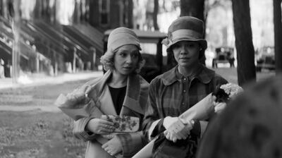 This image released by the Sundance Institute shows Ruth Negga, left, and Tessa Thompson in a scene from "Passing." The film, a directorial debut by Rebecca Hall, will debut at the 2021 Sundance Film Festival. (Sundance Film Festival via AP)