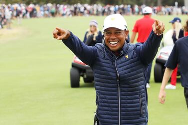 Playing Captain Tiger Woods of the United States team celebrates after clenching the Presidents Cup. Getty
