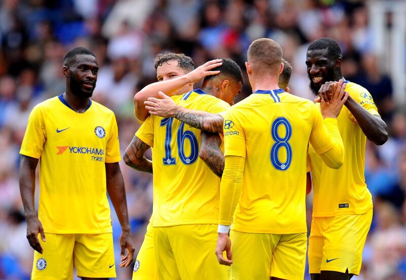 Chelsea players celebrate Kenedy's goal. Getty