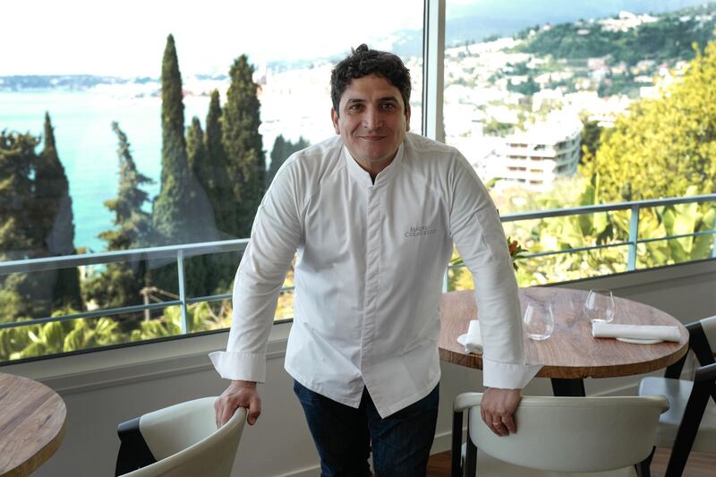 (FILES) In this file photo taken on April 13, 2019 Italian-Argentinian chef Mauro Colagreco poses in his "Mirazur" restaurant on the French riviera city of Menton after being awarded with a third star in the Guide Michelin. Colagreco was elected "best chief of the year" by his French pairs on September 23, 2019. / AFP / VALERY HACHE
