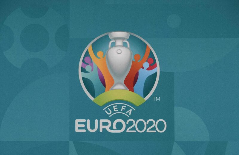 (FILES) This file photograph taken on November 30, 2019, shows the logo of the European Football Championship 2020 ahead of the UEFA Euro 2020 Final Draw Ceremony in Bucharest. UEFA said May 4, 2021, that it will allow increased 26-player squads at this year's European Championship, meeting a demand of coaches who feared players would be sidelined after testing positive for Covid-19. European football's governing body said it had agreed the increase from 23 players "to mitigate the risks of teams facing a shortage of available players for certain matches due to possible positive COVID-19 tests results and subsequent quarantine measures".
 / AFP / Fabrice COFFRINI
