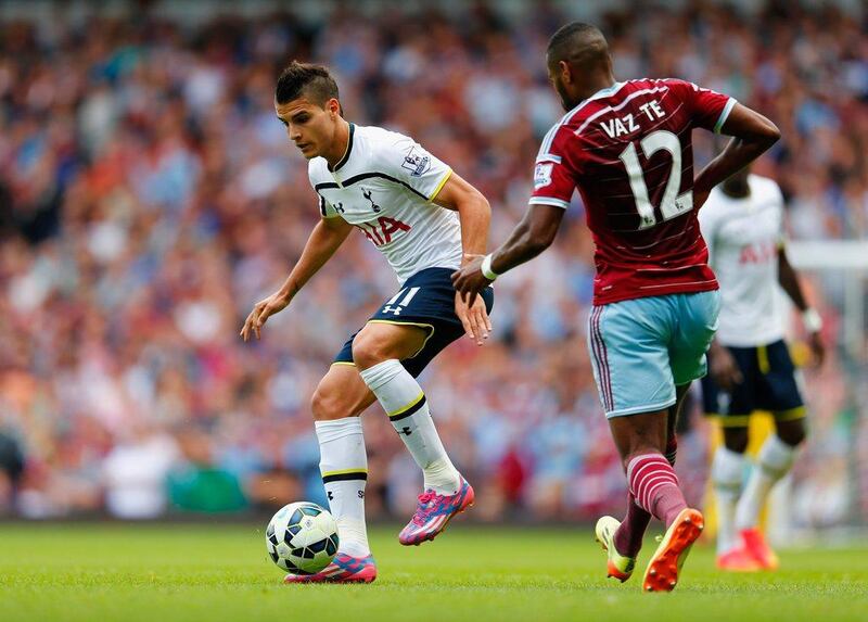 Erik Lamela of Tottenham Hotspur and Ricardo Vaz Te of West Ham United shown during their match on the opening weekend of the Premier League season. Julian Finney / Getty Images / August 16, 2014