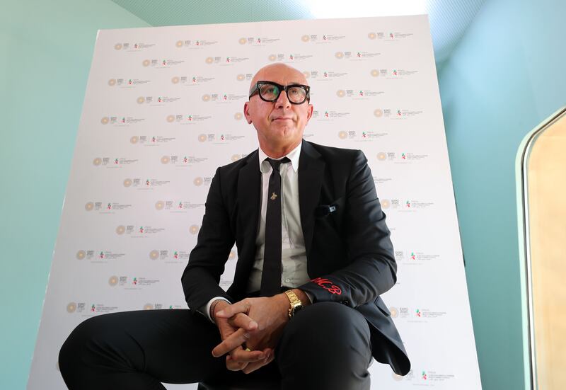 Marco Bizzarri, president of Gucci, announces a project to set up a digital centre to protect art in warzones, at the Expo Italian pavilion. Chris Whiteoak / The National