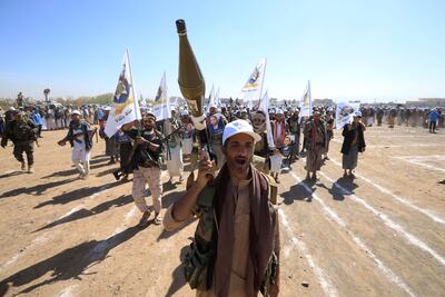 Tribesmen loyal to Houthis march during an anti-US and anti-Israel protest on the outskirts of Sanaa, Yemen. EPA