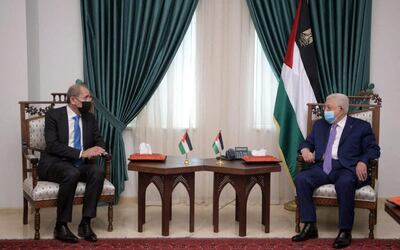 A handout picture released by the Jordanian Foreign Ministry on April 21, 2021 shows Palestinian president Mahmud Abbas (R) meeting with Jordan's Foreign Minister Ayman Safadi in Ramallah.  - XGTY / RESTRICTED TO EDITORIAL USE - MANDATORY CREDIT "AFP PHOTO / JORDANIAN FOREIGN MINISTRY" - NO MARKETING NO ADVERTISING CAMPAIGNS - DISTRIBUTED AS A SERVICE TO CLIENTS
 / AFP / Jordanian Foreign Ministry / - / XGTY / RESTRICTED TO EDITORIAL USE - MANDATORY CREDIT "AFP PHOTO / JORDANIAN FOREIGN MINISTRY" - NO MARKETING NO ADVERTISING CAMPAIGNS - DISTRIBUTED AS A SERVICE TO CLIENTS
