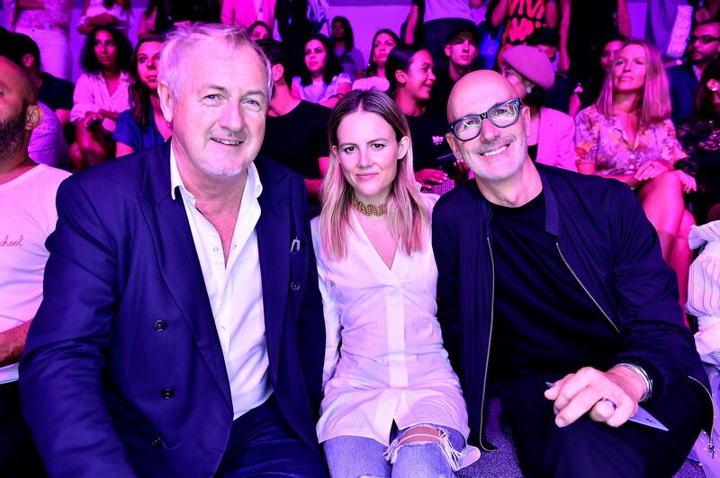 DUBAI, UNITED ARAB EMIRATES - OCTOBER 26:  (L-R) Godfrey Deeny, a guest, and Simon Lock attend the Lara Khoury show on Day 1 of Fashion Forward October 2017 held at the Dubai Design District on October 26, 2017 in Dubai, United Arab Emirates.  (Photo by Cedric Ribeiro/Getty Images for FFWD)