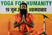 Indian yoga guru Ramdev apologises to top court for misleading adverts