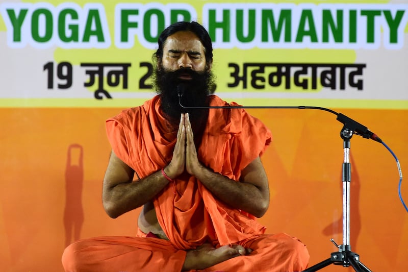 'This all happened in the excitement of work, it won’t happen in future,' Indian yoga guru Ramdev told the Supreme Court of India on Tuesday. AFP