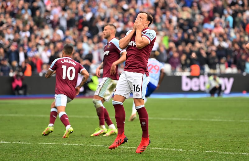 West Ham's Mark Noble reacts after missing a penalty which was saved by David De Gea. Getty